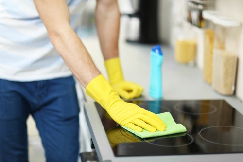 Experienced cleaners in Kingston carrying out detailed surface cleaning