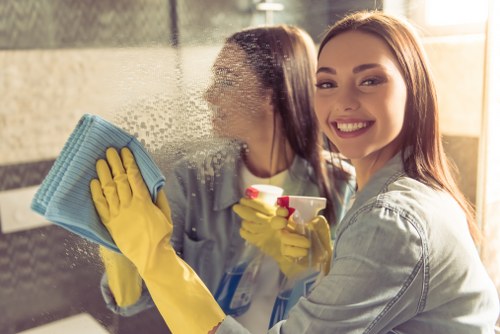 Trained oven cleaning professional inspecting an appliance before cleaning